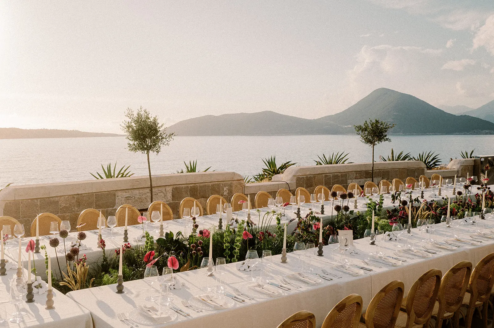 Luxury wedding table setting with floral centerpieces, Mamula Island venue