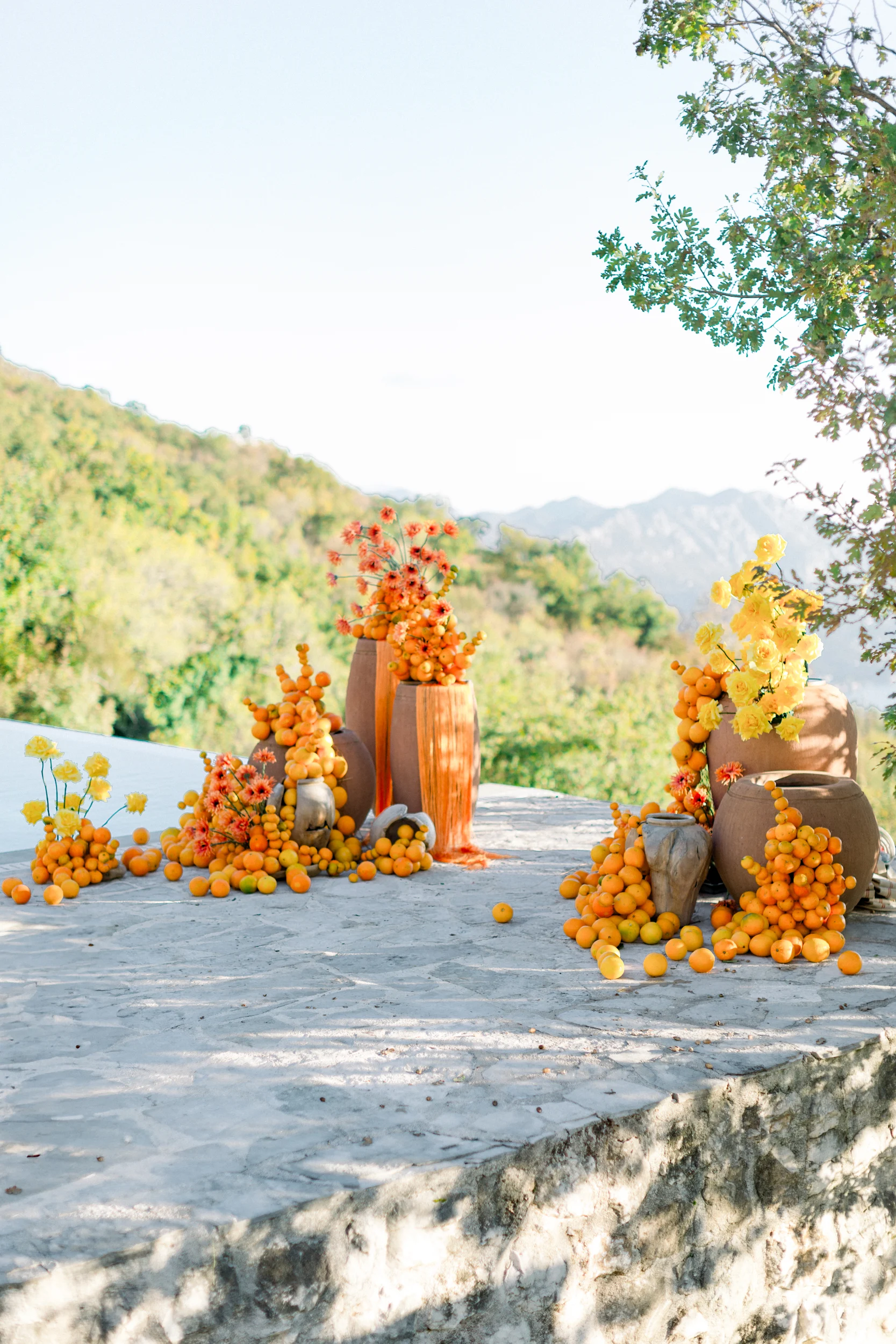 Flottie wedding ceremony decor and organisation for "Citrus Muse" celebration with bright fruit and flower styling at Villa Mona Lisa Montenegro