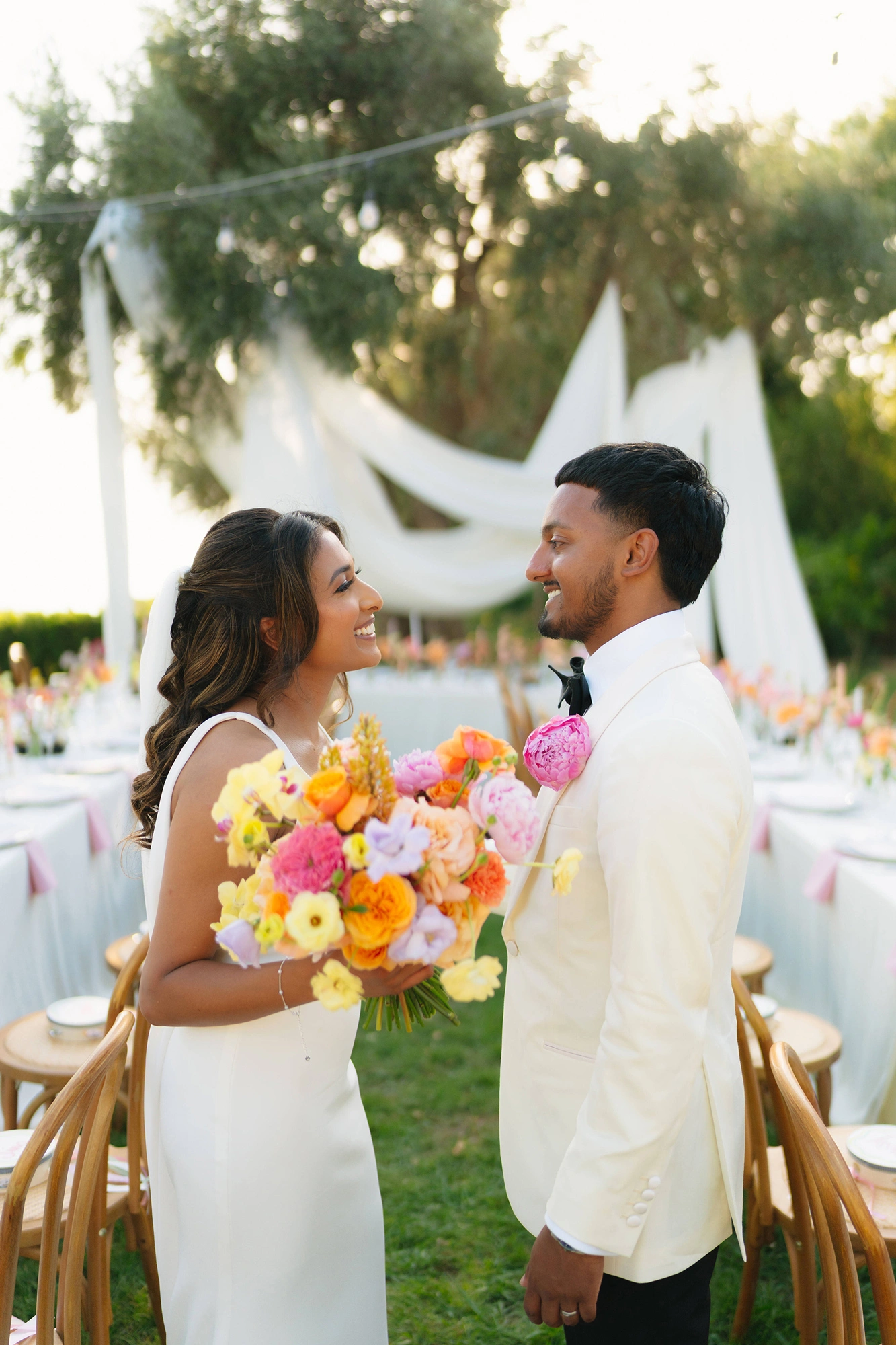 Romantic moment between bride and groom during "Gathered in Joy" wedding dinner, Talici Hill Villa
