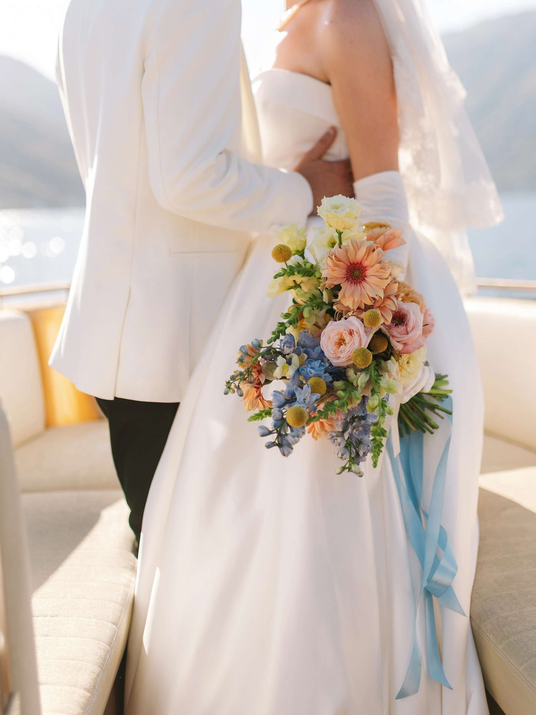 Flottie wedding floral design for "Heritage of Love": close-up of bride's bouquet and decor organisation at Heritage Grand Perast in Montenegro